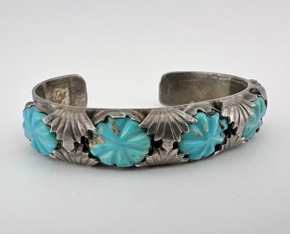 VINTAGE LOYOLITA TSATTIE ZUNI CARVED TURQUOISE STERLING SILVER CUFF BRACELET: VINTAGE LOYOLITA TSATTIE ZUNI CARVED TURQUOISE STERLING SILVER CUFF BRACELET Vintage Loyolita Tsattie Zuni Carved Turquoise Sterling Silver Cuff Bracelet Cuff is 5 1/4" tip to Tip and has a 1" Wide - 