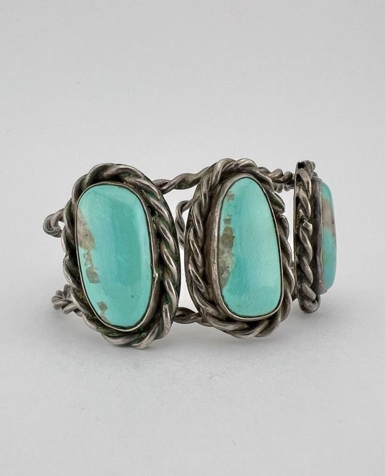 OLD PAWN NAVAJO STERLING SILVER ROYSTON TURQUOISE TWIST SHANK CUFF BRACELET: Old Pawn Navajo Sterling Silver Royston Turquoise Twist Shank Cuff Bracelet Cuff is Slightly Over 5 1/4" tip to Tip and has a 1" Wide Adjustable Gap Cuff Is 1 3/8" Wide In the Center Weight is 48.2 Gr