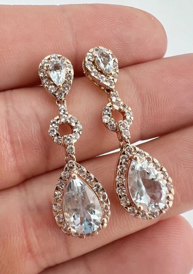 DESIGNER 10K ROSE GOLD BLUE & WHITE TOPAZ HALO DANGLE POST EARRINGS 1.25": DESIGNER 10K ROSE GOLD BLUE & WHITE TOPAZ HALO DANGLE POST EARRINGS 1.25" Designer 10k Rose Gold Blue & White Topaz Halo Dangle Post Earrings 1.25" Size: Slightly Over 1 1/4" Tall & 3/8" Wide At The B