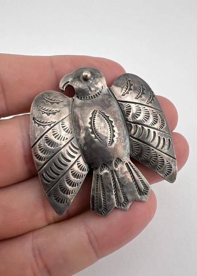 EARLY OLD 1940'S NAVAJO STERLING SILVER CHISELED STAMPED THUNDERBIRD PIN BROOCH: Early Old 1940's Navajo Sterling Silver Chiseled Stamped Thunderbird Pin Brooch Size: 1 3/4" Wide By Just Under 2" Tall Metal: Sterling Silver / Coin Silver Weight is 16.4 Grams on my scale In Great A