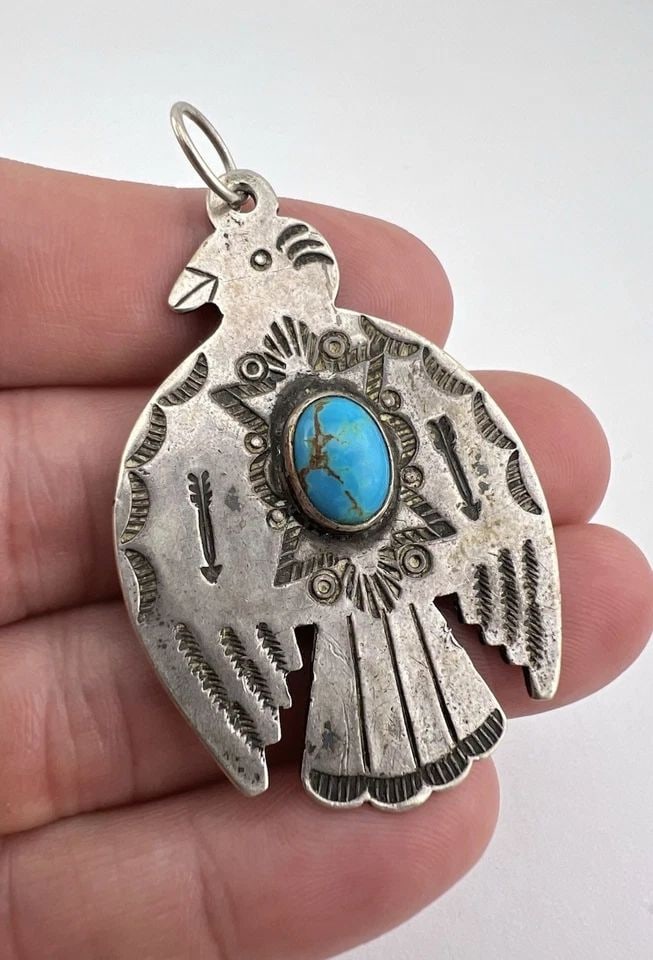 VTG FRED HARVEY ERA NAVAJO STERLING SILVER TURQUOISE STAMPED THUNDERBIRD PENDANT: Vtg Fred Harvey Era Navajo Sterling Silver Turquoise Stamped Thunderbird Pendant Size: 1 3/8" Wide By Just Under 2 1/2" Tall With Bail Metal: Sterling Silver Weight is 12.9 Grams on my scale In Great 
