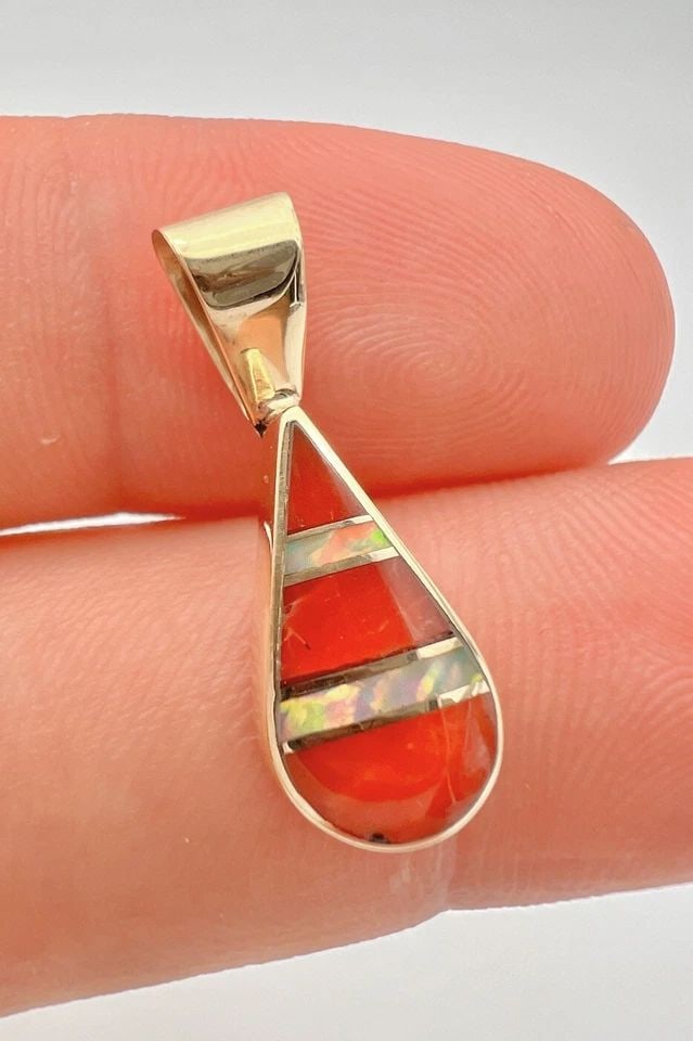 NAVAJO 14K YELLOW GOLD NATURAL FIRE OPAL & MEDITERRANEAN CORAL TEARDROP PENDANT: NAVAJO 14K YELLOW GOLD NATURAL FIRE OPAL & MEDITERRANEAN CORAL TEARDROP PENDANT Vintage Navajo 14k Yellow Gold Natural Fire Opal & Mediterranean Coral Teardrop Pendant Size: 7/8" Tall With Bail By 3/8