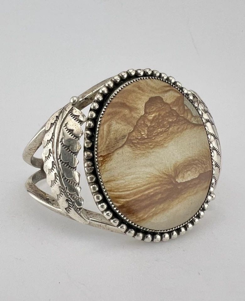 VINTAGE NAVAJO STERLING SILVER PICTURE JASPER STAMPED WIDE CUFF BRACELET #1: VINTAGE NAVAJO STERLING SILVER PICTURE JASPER STAMPED WIDE CUFF BRACELET #1 Vintage Navajo Sterling Silver Picture Jasper Stamped WIDE Cuff Bracelet Cuff is 5 1/8" tip to Tip and has a 1" Wide Adjusta
