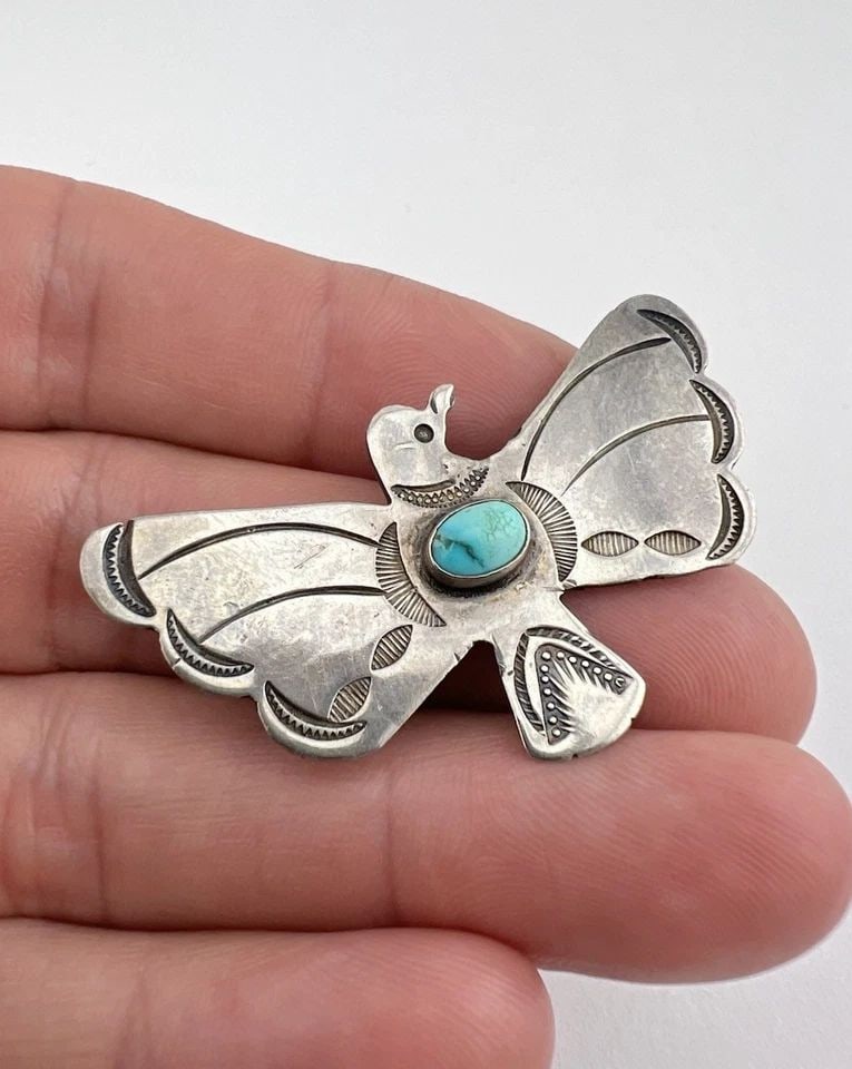 OLD 1940'S NAVAJO STERLING SILVER TURQUOISE STAMPED THUNDERBIRD BROOCH PENDANT: Old 1940's Navajo Sterling Silver Turquoise Stamped Thunderbird Brooch Pendant Size: About 2" Wide By 1 1/4" Tall Metal: Sterling Silver / Coin Silver Weight is 7.0 Grams on my scale Can Be Worn as A 
