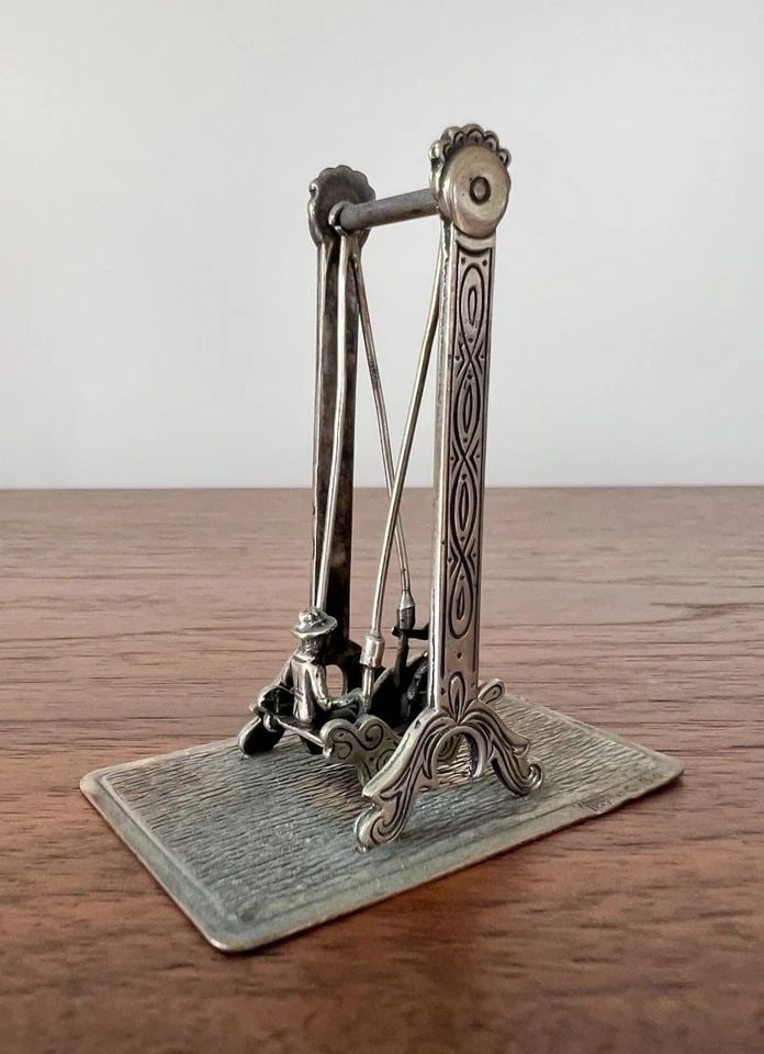 ANTIQUE STERLING SILVER MINIATURE DOLLHOUSE 3D STANDING SWING SCENE SCULPTURE: ANTIQUE STERLING SILVER MINIATURE DOLLHOUSE 3D STANDING SWING SCENE SCULPTURE Antique Sterling Silver Miniature Dollhouse 3D Standing Swing Scene Sculpture Size: 2 1/2" Tall By About 2 1/4" Wide & Sli