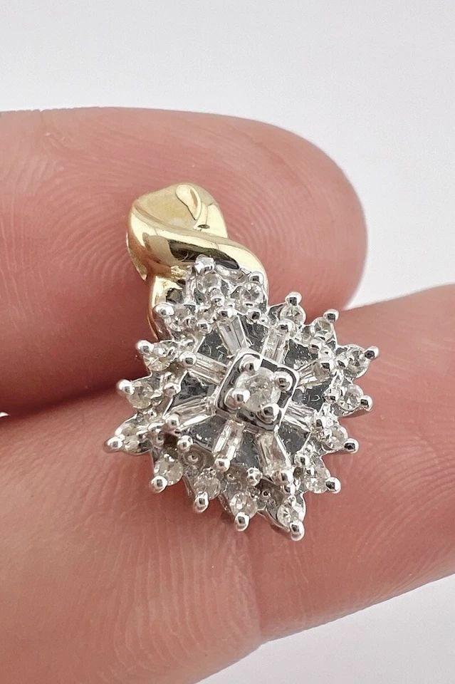 DESIGNER 10K YELLOW & WHITE GOLD ROUND & BAGUETTE DIAMOND HALO DANGLE PENDANT: DESIGNER 10K YELLOW & WHITE GOLD ROUND & BAGUETTE DIAMOND HALO DANGLE PENDANT Designer 10K Yellow & White Gold Round & Baguette Diamond Halo Dangle Pendant Size: 3/4" Tall With Bail By 5/8" Wide Metal