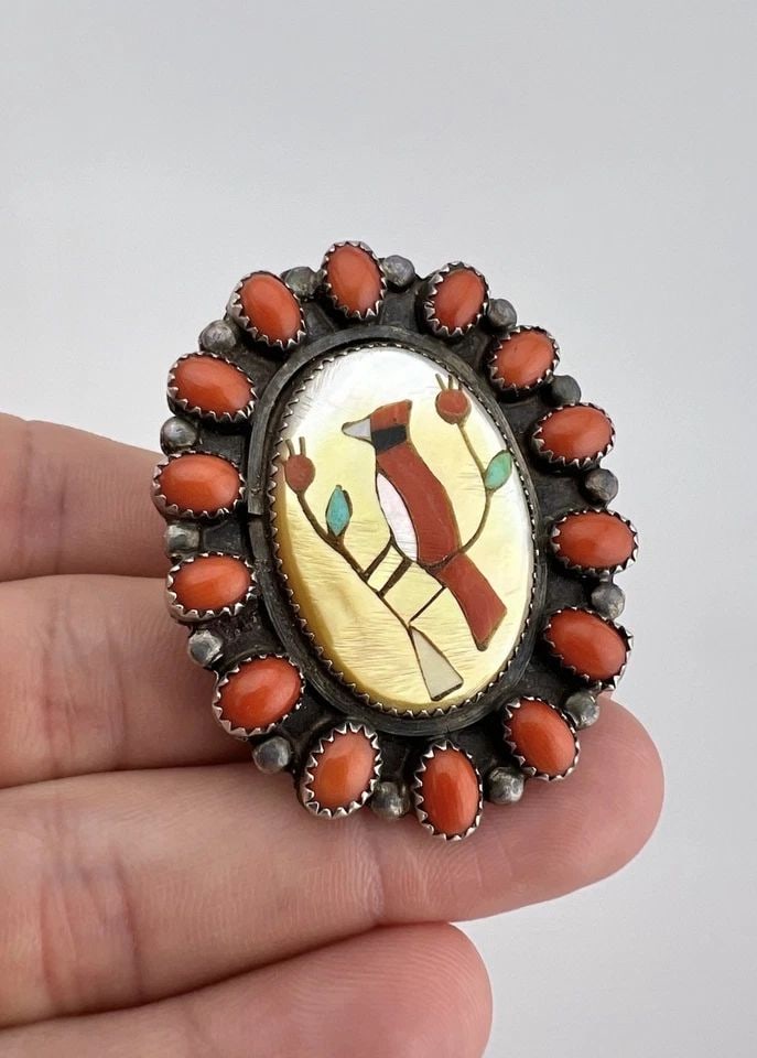 VINTAGE RAB ZUNI STERLING SILVER CORAL & MULTI GEM CARDINAL BIRD CLUSTER RING: Vintage RAB Zuni Sterling Silver Coral & Multi Gem Cardinal Bird Cluster Ring Ring Size: 7.5 Weight is 20.8 Grams on my scale Test Positive For Sterling Silver Ring is 2" Tall In the Center by 1 5/8" 