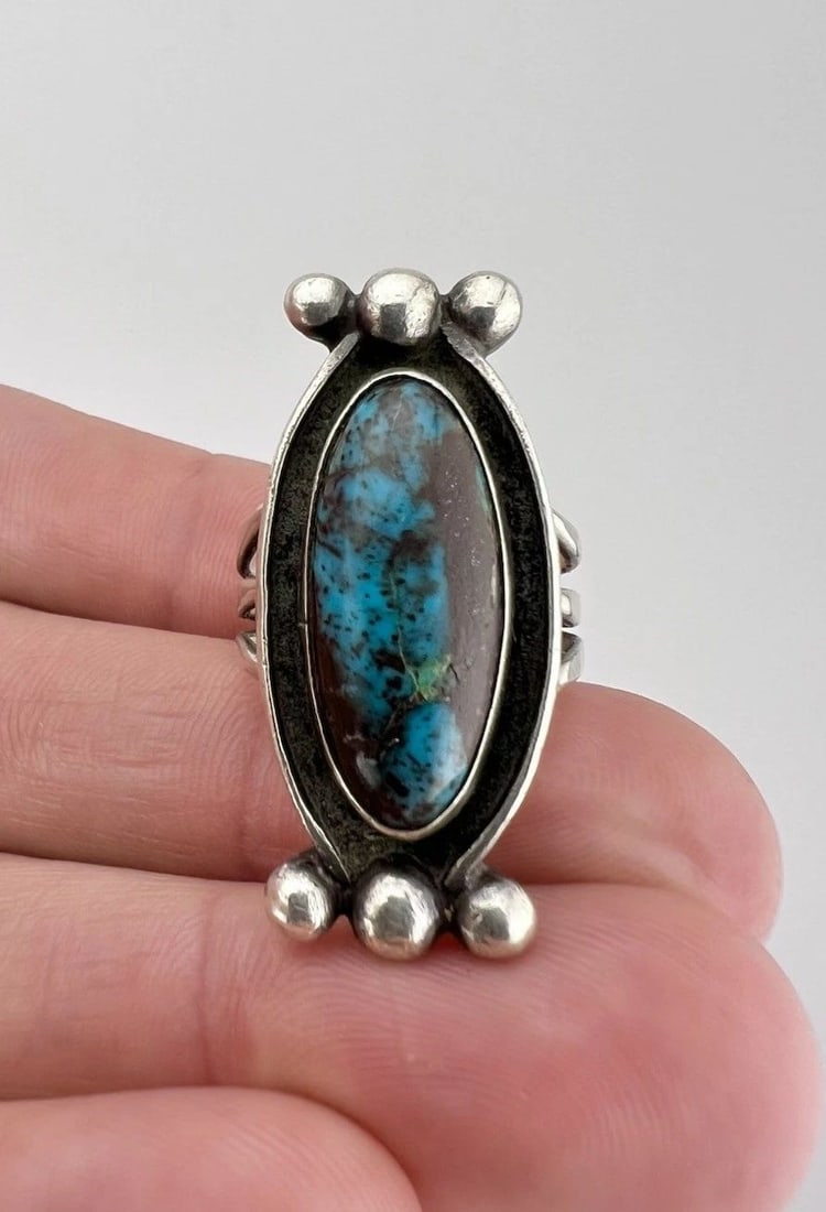 EARLY OLD NAVAJO STERLING SILVER HIGH GRADE BISBEE TURQUOISE SHADOWBOX LONG RING: Early Old Navajo Sterling Silver High Grade Bisbee Turquoise Shadowbox Long Ring Ring Size: 7.75 - Can Be Re Sized Weight is 10.7 Grams on my scale Metal: Sterling Silver Ring is Over 1 1/4" Tall In t