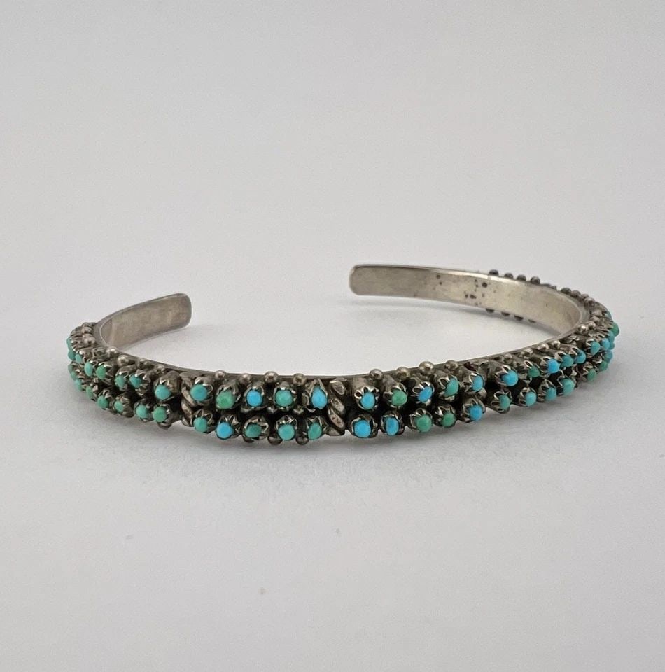 RARE PETER & VIVIAN HALOO ZUNI STERLING SILVER SNAKE EYE TURQUOISE CUFF BRACELET: RARE Peter & Vivian Haloo Zuni Sterling Silver Snake Eye Turquoise Cuff Bracelet Cuff is A Tad Over 5" tip to Tip and has a 1" Wide Gap Cuff Is 1/4" Wide Weight is 11.2 Grams on my scale Test Positive