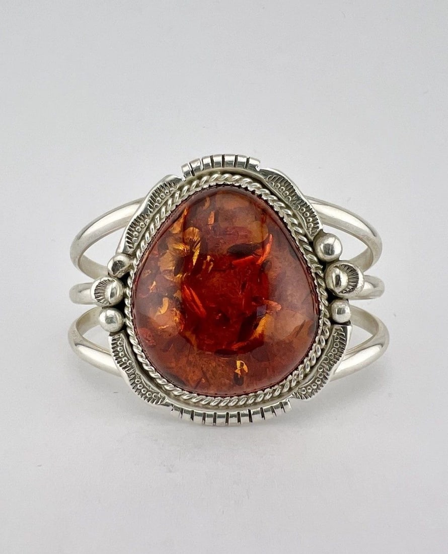 VINTAGE BB NAVAJO STERLING SILVER BALTIC HONEY AMBER WIDE CUFF BRACELET 48.9G: Vintage BB Navajo Sterling Silver Natural Baltic Honey Amber Wide Cuff Bracelet 48.9g Cuff is 5 1/4" tip to Tip and has a 1 1/8" Wide Adjustable Gap Cuff Is 1 3/4" Wide In the Center Weight is 48.9 Gr