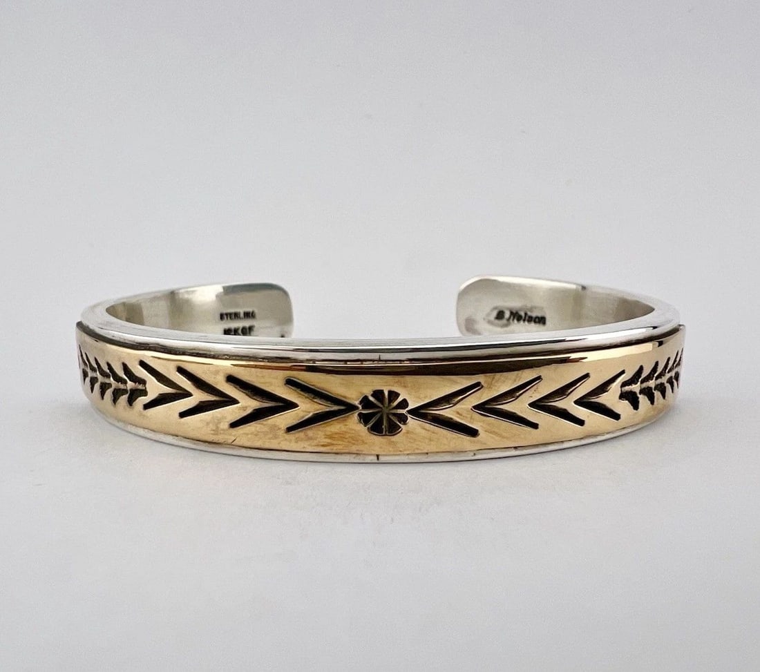 VTG B NELSON NAVAJO STERLING SILVER & GOLD-FILLED STAMPED CUFF BRACELET 42.8G: Vtg B Nelson Navajo Sterling Silver & Gold-Filled Stamped Cuff Bracelet 42.8g Cuff is Just under 5 3/4" tip to Tip and has a 1" Wide Adjustable Gap Cuff Is 3/8" Wide Weight is 42.8 Grams on my scale M