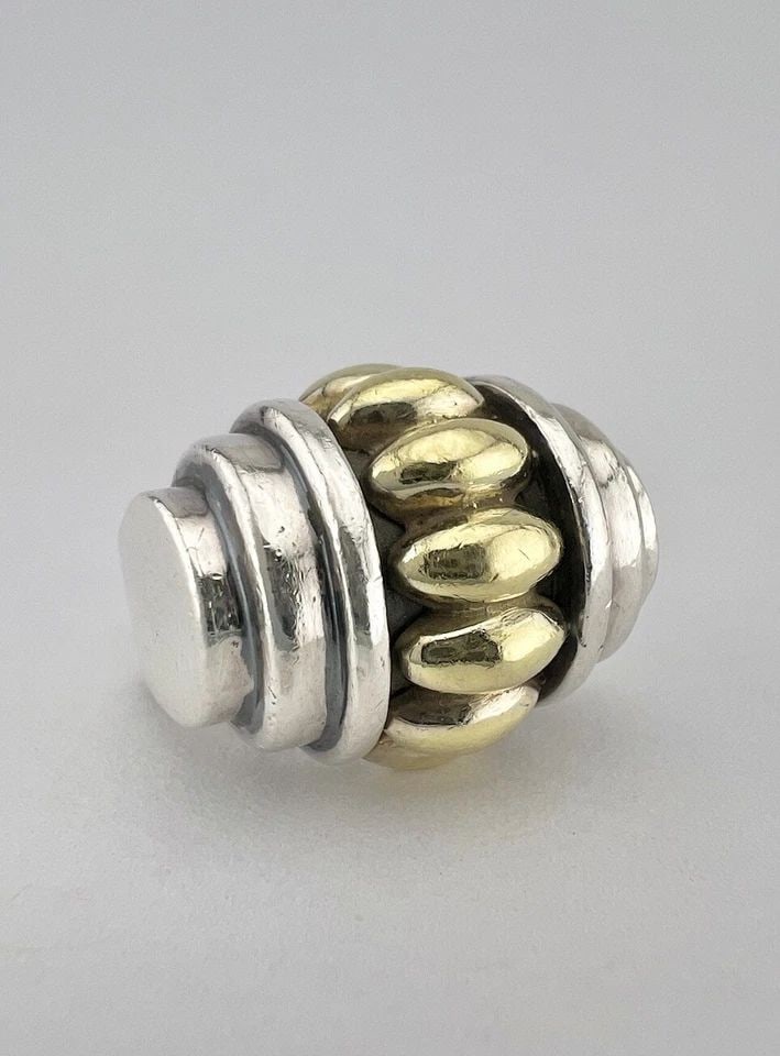 LAGOS STERLING SILVER & 18K YELLOW GOLD CAVIAR RING: LAGOS STERLING SILVER & 18K YELLOW GOLD CAVIAR RING LAGOS Sterling Silver & 18K Yellow Gold Caviar Ring Ring Size: 5.5 - Can Be Resized Metal: Sterling Silver & 18k Yellow gold Weight is 13.3 Grams on
