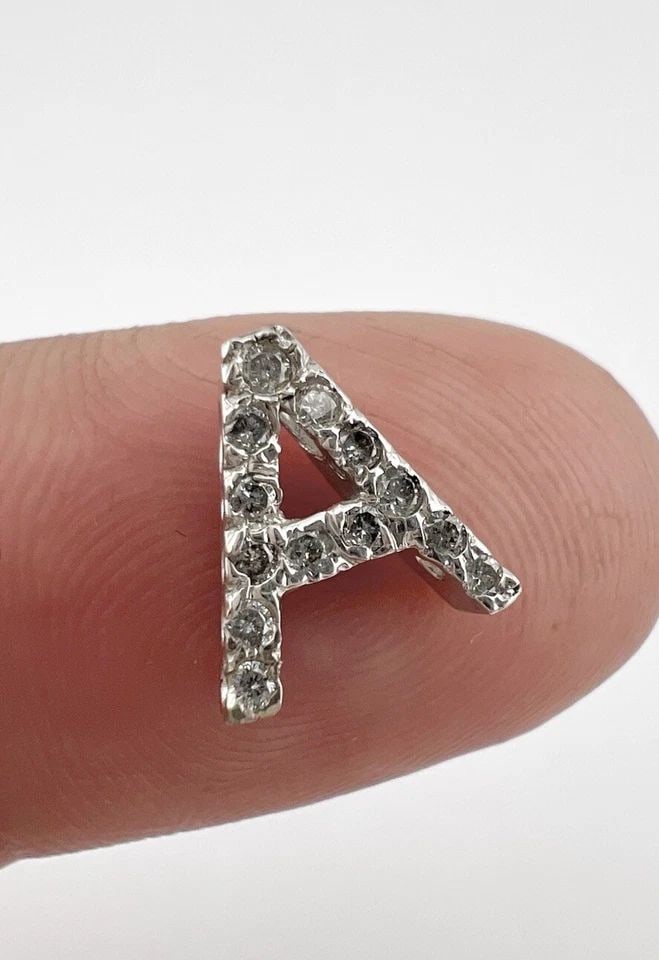 DESIGNER 14K WHITE GOLD LETTER "A" DIAMOND SLIDE CHARM PENDANT: DESIGNER 14K WHITE GOLD LETTER "A" DIAMOND SLIDE CHARM PENDANT Designer 14k White Gold Letter "A" Diamond Slide Charm Pendant Size: 3/8" (9mm) Tall by 3/8" (8.5mm) Wide Weight is 1.0 Grams on My Scale