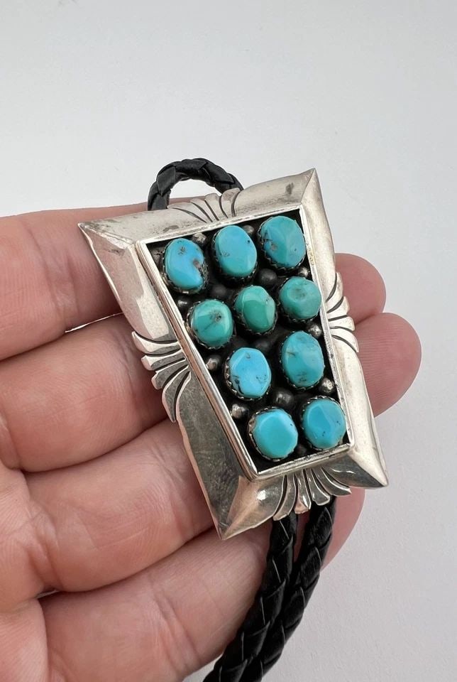 VTG NAVAJO STERLING SILVER BLUE FOX TURQUOISE STAMPED SHADOWBOX BOLO TIE 2": Vtg Navajo Sterling Silver Blue Fox Turquoise Stamped Shadowbox Bolo Tie 2" Size: 2" Tall by 1 5/8" Wide at the Top Weight is 34.9 Grams on my scale Metal: Sterling Silver Amazing Natural High Grade K