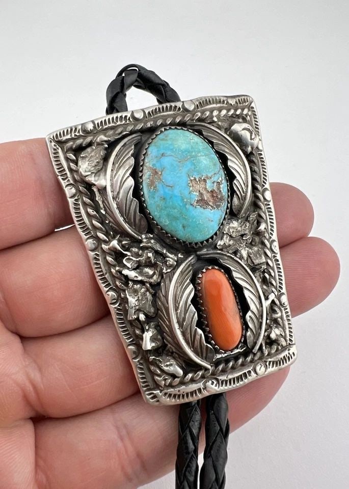 VTG NAVAJO STERLING SILVER KINGMAN TURQUOISE & RED CORAL STAMPED BOLO TIE 2.25": VTG NAVAJO STERLING SILVER KINGMAN TURQUOISE & RED CORAL STAMPED BOLO TIE 2.25" Vtg Navajo Sterling Silver Kingman Turquoise & Red Coral Stamped Bolo Tie 2.25" Size: 2 1/4" Tall by Just Under 2" Wide 
