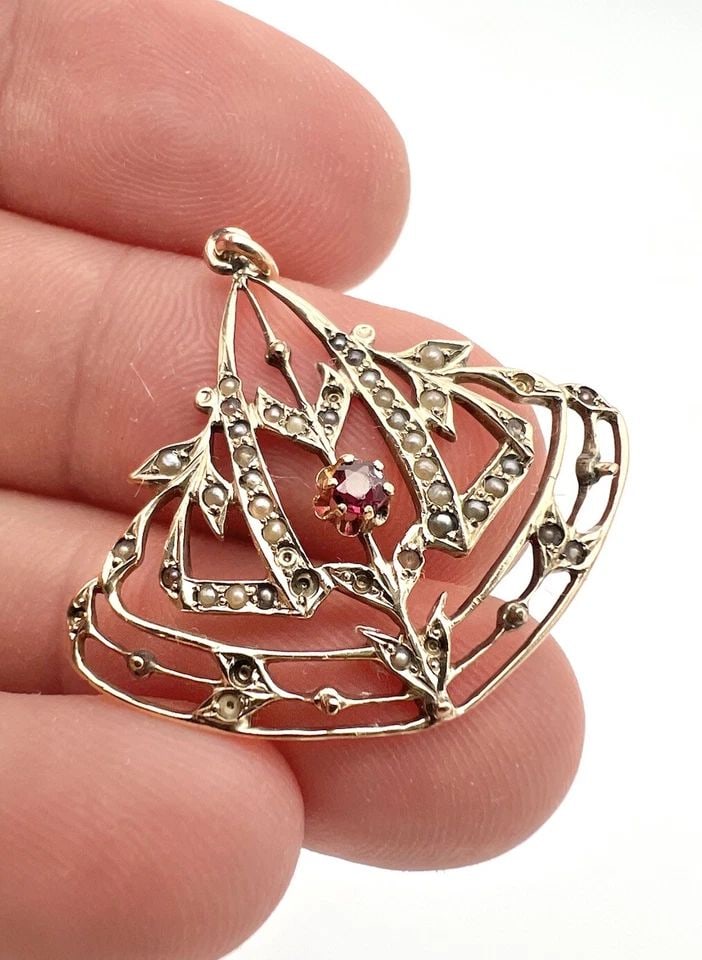 ANTIQUE VICTORIAN 14K YELLOW GOLD SEED PEARL & BOHEMIAN GARNET LAVALIER PENDANT: ANTIQUE VICTORIAN 14K YELLOW GOLD SEED PEARL & BOHEMIAN GARNET LAVALIER PENDANT Antique Victorian 14k Yellow Gold Seed Pearl & Bohemian Garnet LAVALIER Pendant Size: 1 1/4" Tall By 1 1/4" Wide Weight 