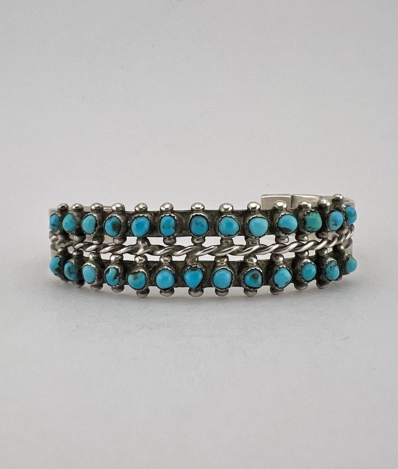VTG FRED HARVEY ERA ZUNI TURQUOISE STERLING SILVER 2 ROW SNAKE EYE CUFF BRACELET: VTG FRED HARVEY ERA ZUNI TURQUOISE STERLING SILVER 2 ROW SNAKE EYE CUFF BRACELET Vtg Fred Harvey Era Zuni Turquoise Sterling Silver 2 Row Snake Eye Stamped Cuff Bracelet Cuff is 5 1/4" tip to Tip and 