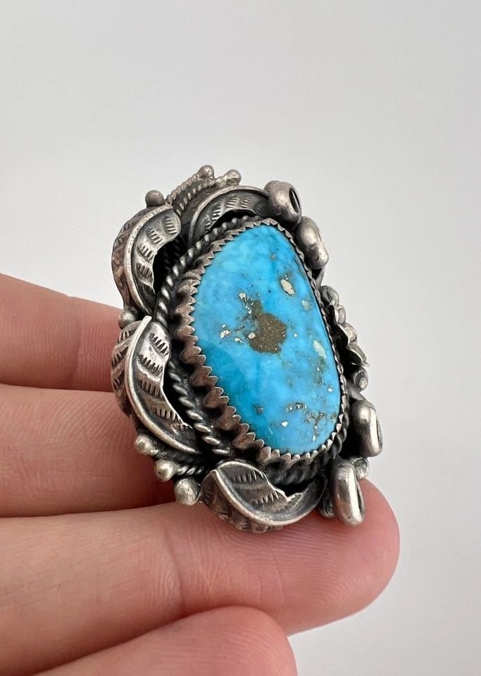 VINTAGE NAVAJO STERLING SILVER HIGH GRADE MORENCI TURQUOISE STAMPED RING 23.3G: HUGE Vintage Navajo Sterling Silver High Grade Morenci Turquoise Stamped Ring 23.3g Ring Size: 7.75 - Can Be Resized Weight is 23.3 Grams on my scale Test Positive For Sterling Silver Ring is 1 3/4" T