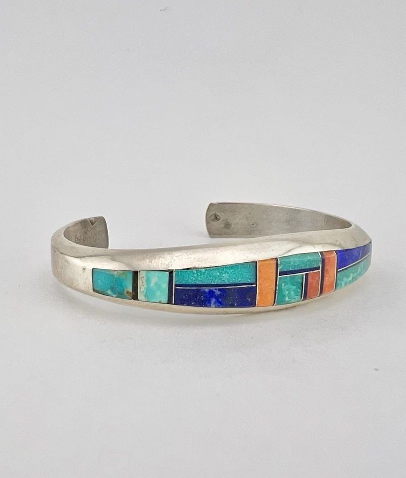 PHILLIP SANCHEZ NAVAJO STERLING SILVER MULTI GEMSTONE FLUSH CUFF BRACELET #1: PHILLIP SANCHEZ NAVAJO STERLING SILVER MULTI GEMSTONE FLUSH CUFF BRACELET #1 Vtg Phillip Sanchez Navajo Sterling Silver Multi Gemstone Flush Cuff Bracelet #1 Cuff is 5 3/8" tip to Tip and has a 1 1/8"
