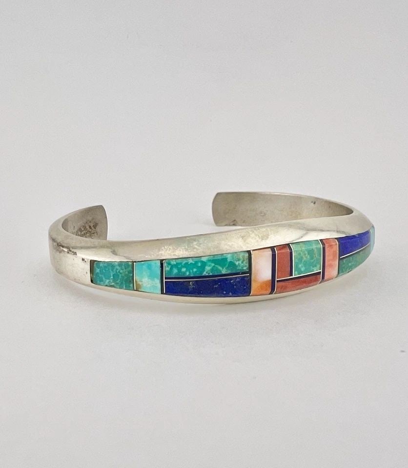 VTG PHILLIP SANCHEZ NAVAJO STERLING SILVER MULTI GEMSTONE FLUSH CUFF BRACELET #2: VTG PHILLIP SANCHEZ NAVAJO STERLING SILVER MULTI GEMSTONE FLUSH CUFF BRACELET #2 Vtg Phillip Sanchez Navajo Sterling Silver Multi Gemstone Flush Cuff Bracelet #2 Cuff is 5 1/2" tip to Tip and has a 1 