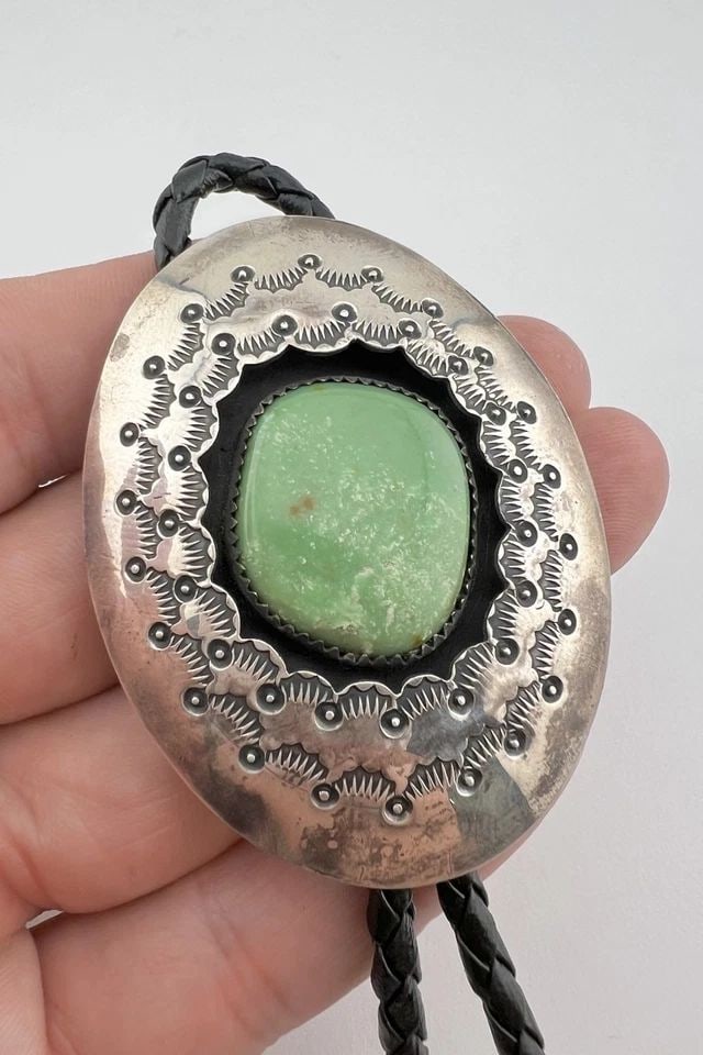 VTG NAVAJO STERLING SILVER BLUE GEM TURQUOISE STAMPED SHADOWBOX BOLO TIE 2 3/8": VTG NAVAJO STERLING SILVER BLUE GEM TURQUOISE STAMPED SHADOWBOX BOLO TIE 2 3/8" Vtg Navajo Sterling Silver Blue Gem Turquoise Stamped Shadowbox Bolo Tie 2 3/8" Size: 2 3/8" Tall by 1 3/4" Wide Weight 