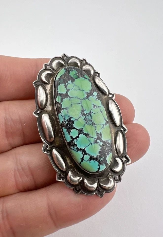 VTG M. VILLANUEVA NAVAJO STERLING SILVER SPIDERWEB TURQUOISE STAMPED PIN PENDANT: VTG M. VILLANUEVA NAVAJO STERLING SILVER SPIDERWEB TURQUOISE STAMPED PIN PENDANT Vtg M. Villanueva Navajo Sterling Silver Spiderweb Turquoise Stamped Pin Pendant Size: 2 1/8" Tall by 1 1/4" Wide Metal