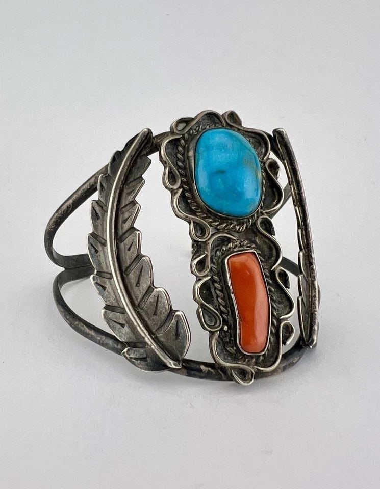 VTG NAVAJO STERLING SILVER BLUE GEM TURQUOISE & CORAL STAMPED WIDE CUFF BRACELET: VTG NAVAJO STERLING SILVER BLUE GEM TURQUOISE & CORAL STAMPED WIDE CUFF BRACELET Vtg Navajo Sterling Silver Blue Gem Turquoise & Coral Stamped Wide Cuff Bracelet Cuff is Around 5" tip to Tip and has a