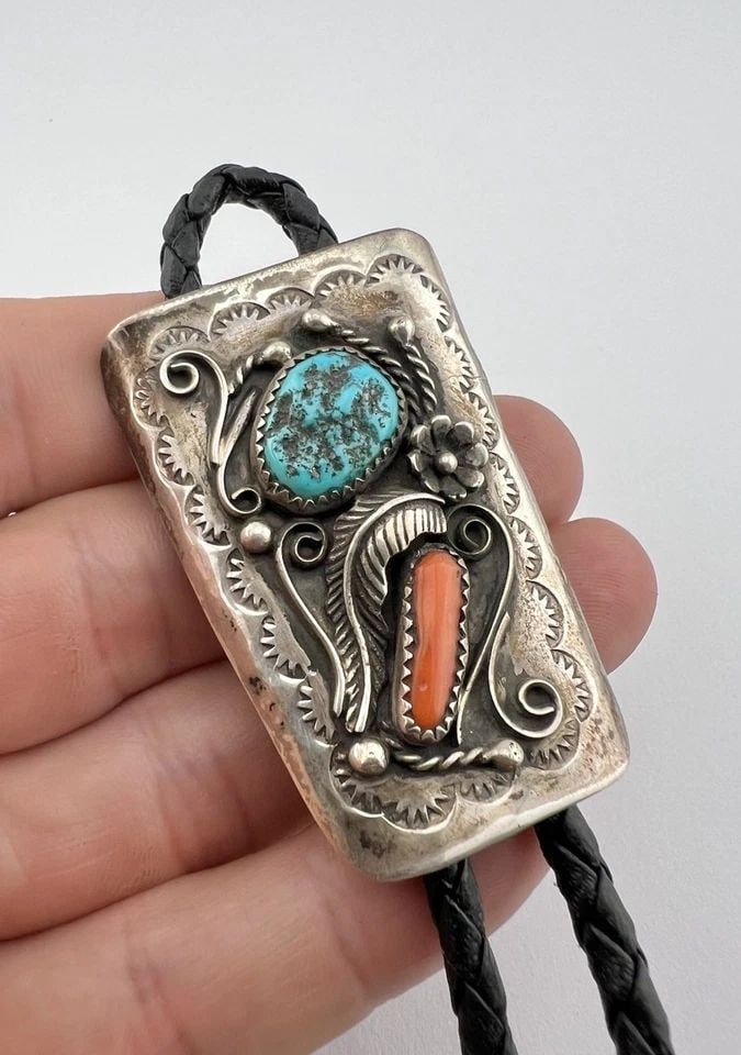 VTG NAVAJO STERLING SILVER KINGMAN TURQUOISE & RED CORAL STAMPED BOLO TIE 2 1/8": VTG NAVAJO STERLING SILVER KINGMAN TURQUOISE & RED CORAL STAMPED BOLO TIE 2 1/8" Vtg Navajo Sterling Silver Kingman Turquoise & Red Coral Stamped Bolo Tie 2 1/8" Size: 2 1/8" Tall by Over 1 1/4" Wide 