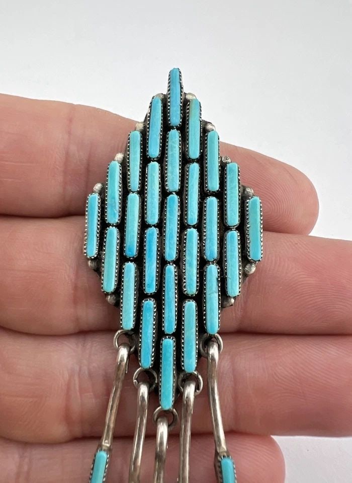 ARVINA PINTO ZUNI STERLING SILVER TURQUOISE DASH CLUSTER DANGLE BROOCH PENDANT: Vintage Arvina Pinto Zuni Sterling Silver Turquoise Dash Cluster Dangle Brooch Pendant Size: 3 1/8" Tall With Dangle & 1 1/8" Wide Weight is 10.9 Grams on my scale Test Positive For Sterling Silver Am
