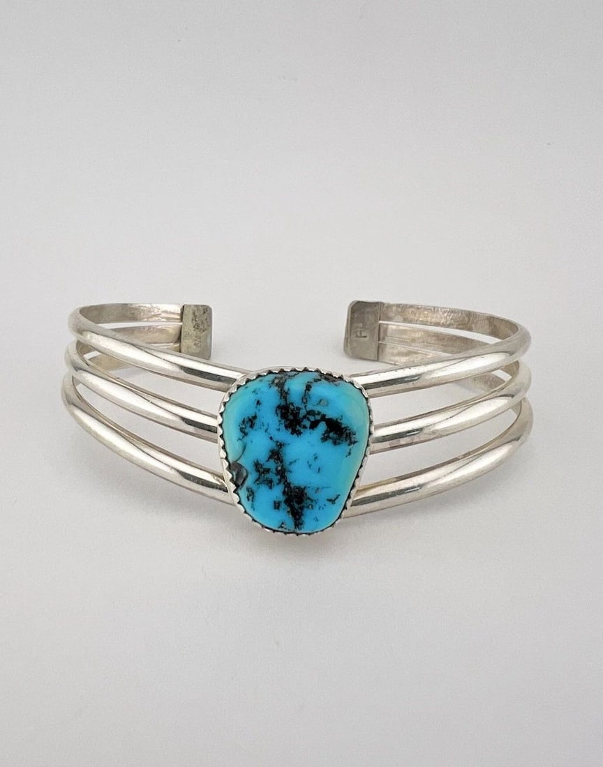 VINTAGE NAVAJO STERLING SILVER SLEEPING BEAUTY TURQUOISE 3 SHANK CUFF BRACELET: Vintage Navajo Sterling Silver Sleeping Beauty Turquoise 3 Shank Cuff Bracelet Cuff is 5 7/8" tip to Tip and has a 3/4" Wide Adjustable Gap Cuff Is 3/4" Wide In the Center Weight is 25.6 Grams on my s