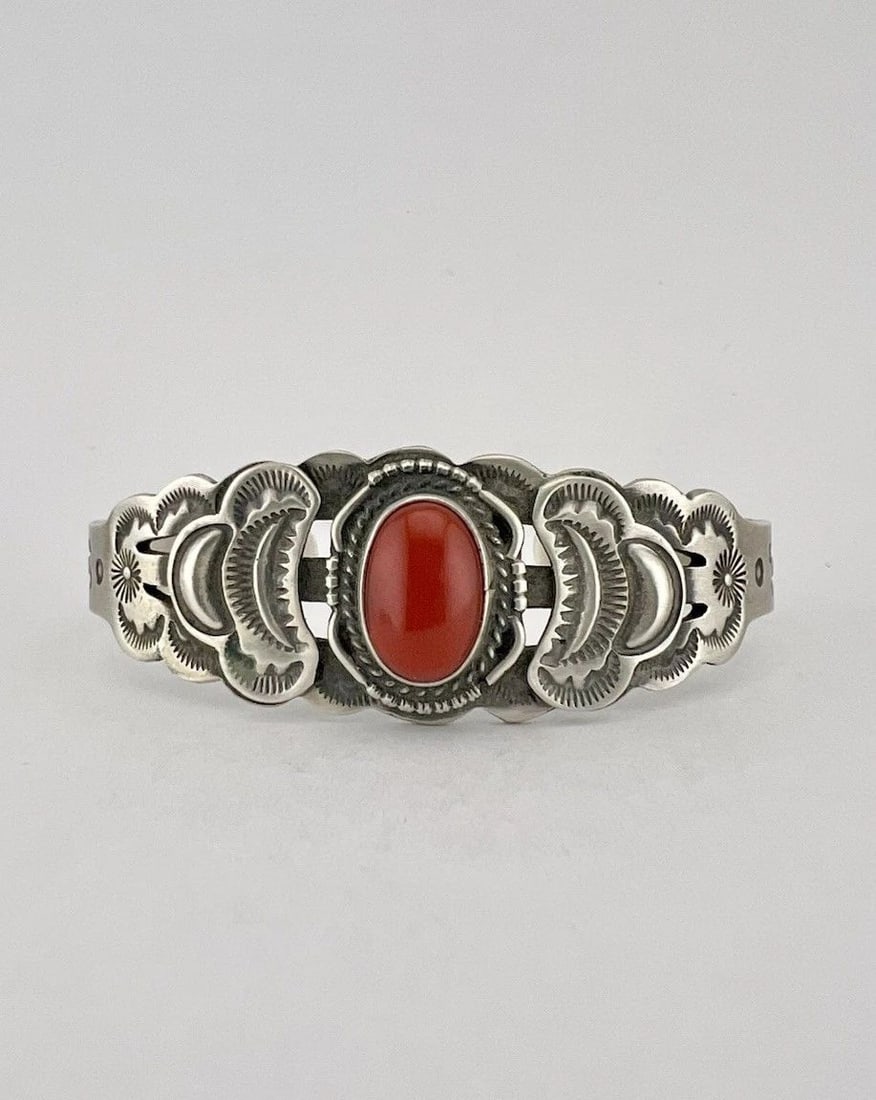 ALBERT PAYTON NAVAJO STERLING SILVER MEDITERRANEAN CORAL STAMPED CUFF BRACELET: Albert Payton Navajo Sterling Silver Mediterranean Coral Stamped Cuff Bracelet Cuff is 5 3/8" tip to Tip and has a 1" Wide Adjustable Gap Cuff Is Over 3/4" Wide in The Center Weight is 22.0 Grams on m