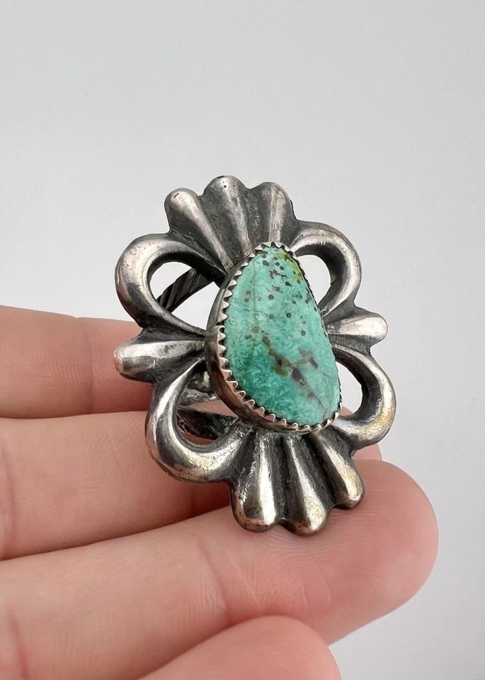 VTG NAVAJO SANDCAST STERLING SILVER NATURAL TURQUOISE LONG RING 1 5/8" - 20.8G: Vtg Navajo Sandcast Sterling Silver Natural Turquoise Long Ring 1 5/8" - 20.8g Ring Size: 7.25 Weight is 20.8 Grams on my scale Metal: Sterling Silver Ring is 1 5/8" Tall In the Center Amazing Natural