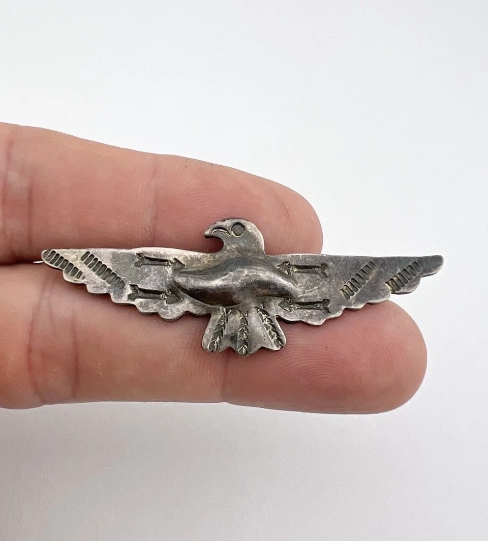 OLD FRED HARVEY ERA NAVAJO STERLING SILVER STAMPED THUNDERBIRD PIN BROOCH 2.25": OLD Fred Harvey Era Navajo Sterling Silver Stamped Thunderbird / Arrow Pin Brooch 2.25" Size: 2 1/4" Wide By Slightly Over 3/4" Tall Metal: Coin Silver / Sterling Silver Weight is 4.5 Grams on my scal