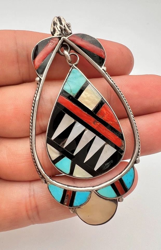 VTG ZUNI STERLING SILVER NATURAL MULTI GEMSTONE FLUSH INLAY DANGLE PENDANT 3": VTG ZUNI STERLING SILVER NATURAL MULTI GEMSTONE FLUSH INLAY DANGLE PENDANT 3" Vtg ZUNI Sterling Silver Natural Multi Gemstone Flush Inlay Dangle Pendant 3" Size: 3" Tall By 1 1/2" Wide Metal: Sterling