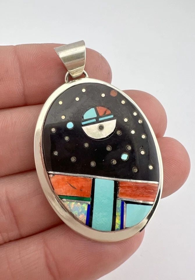 VTG NAVAJO STERLING SILVER MULTI GEMSTONE SUNFACE & GALAXY FLUSH PENDANT 2": VTG NAVAJO STERLING SILVER MULTI GEMSTONE SUNFACE & GALAXY FLUSH PENDANT 2" Vtg Navajo Sterling Silver Multi Gemstone Sunface & Galaxy Flush Pendant 2" Size: 2" Tall With Bail & 1 1/4" Wide Weight is 