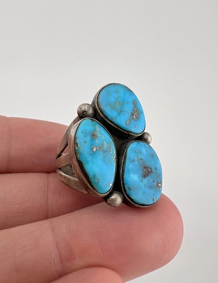 OLD PAWN NAVAJO STERLING SILVER HIGH GRADE MORENCI TURQUOISE WOMEN'S RING: Old Pawn Navajo Sterling Silver High Grade Morenci Turquoise Women's Ring Ring Size: 7 - Can Be Resized Weight is 11.4 Grams on my scale Test Positive For Sterling Silver Ring is 1 1/8" Tall In the Ce