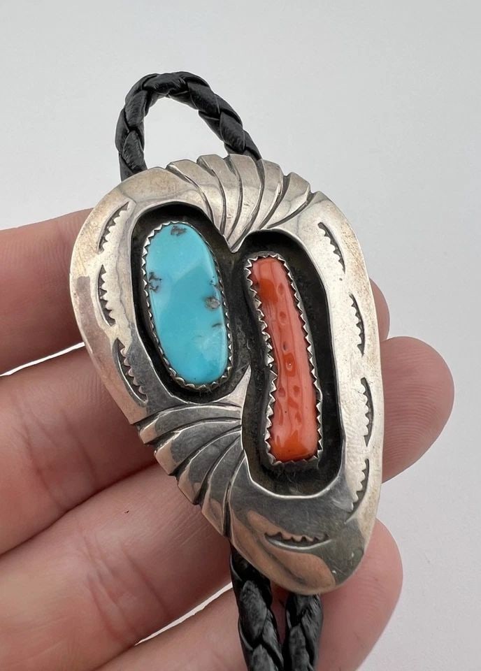 VTG NAVAJO STERLING SILVER TURQUOISE & CORAL STAMPED SHADOWBOX BOLO TIE 2 1/8": VTG NAVAJO STERLING SILVER TURQUOISE & CORAL STAMPED SHADOWBOX BOLO TIE 2 1/8" Vtg Navajo Sterling Silver Turquoise & Coral Stamped Shadowbox Bolo Tie 2 1/8" Size: 2 1/8" Tall by 1 5/8" Wide Weight is