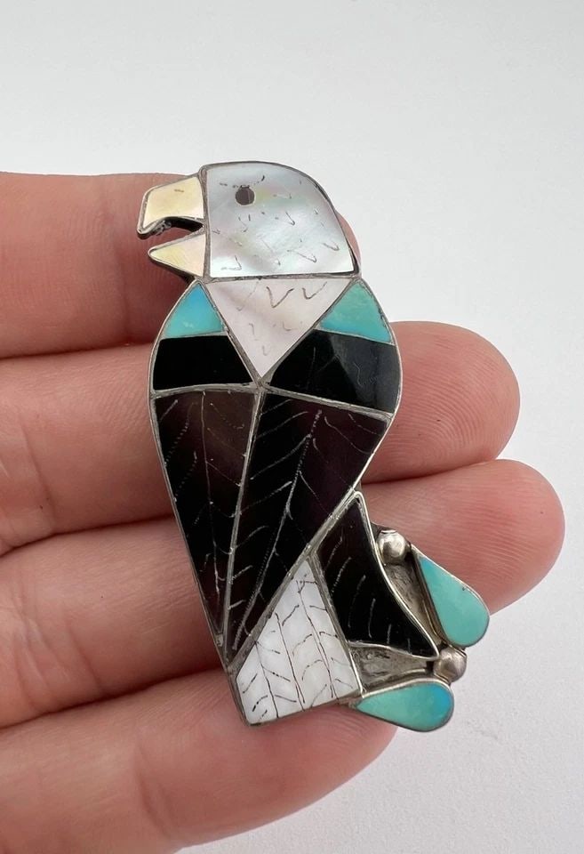 VTG ZUNI CARLENE LEEKITY STERLING SILVER FLUSH INLAY EAGLE PIN PENDANT 2 1/8": Vtg Zuni CARLENE LEEKITY Sterling Silver Flush Inlay EAGLE Pin Pendant 2 1/8" Size: 1" Wide By 2 1/8" Tall Metal: Sterling Silver Weight is 7.0 Grams on my scale Artist Signed: CARLENE LEEKITY Can be 