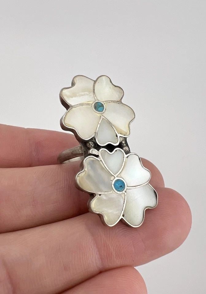 HUGE VTG ANSELM & ROSITA WALLACE ZUNI SILVER MOTHER OF PEARL DOUBLE FLOWER RING: HUGE Vtg Anselm & Rosita Wallace ZUNI Silver Mother of Pearl Double Flower Ring Ring Size: 5.25 - Can Be resized Weight is 7.0 Grams on my scale Metal: Sterling Silver Ring is 1 5/8" Tall In the Cente