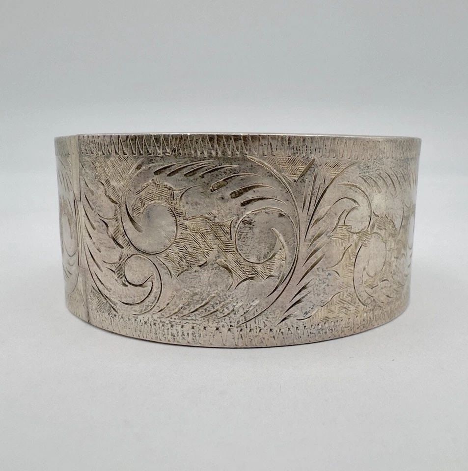 ANTIQUE VICTORIAN STERLING SILVER ENGRAVED SCROLL WIDE BANGLE BRACELET 58.8G: ANTIQUE VICTORIAN STERLING SILVER ENGRAVED SCROLL WIDE BANGLE BRACELET 58.8G Antique Victorian Sterling Silver Engraved Scroll Wide Bangle Bracelet 58.8g Size: 1 1/4" Wide & opening is 2 3/8" By 2 3/8