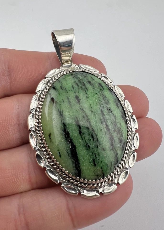 VTG AJ NAVAJO STERLING SILVER HIGH GRADE GREEN JADE STAMPED PENDANT 2.5": VTG AJ NAVAJO STERLING SILVER HIGH GRADE GREEN JADE STAMPED PENDANT 2.5" Vtg AJ Navajo Sterling Silver High Grade Green Jade Stamped Pendant 2.5" Size: 2 1/2" Tall With Bail & 1 5/8" Wide Weight is 27