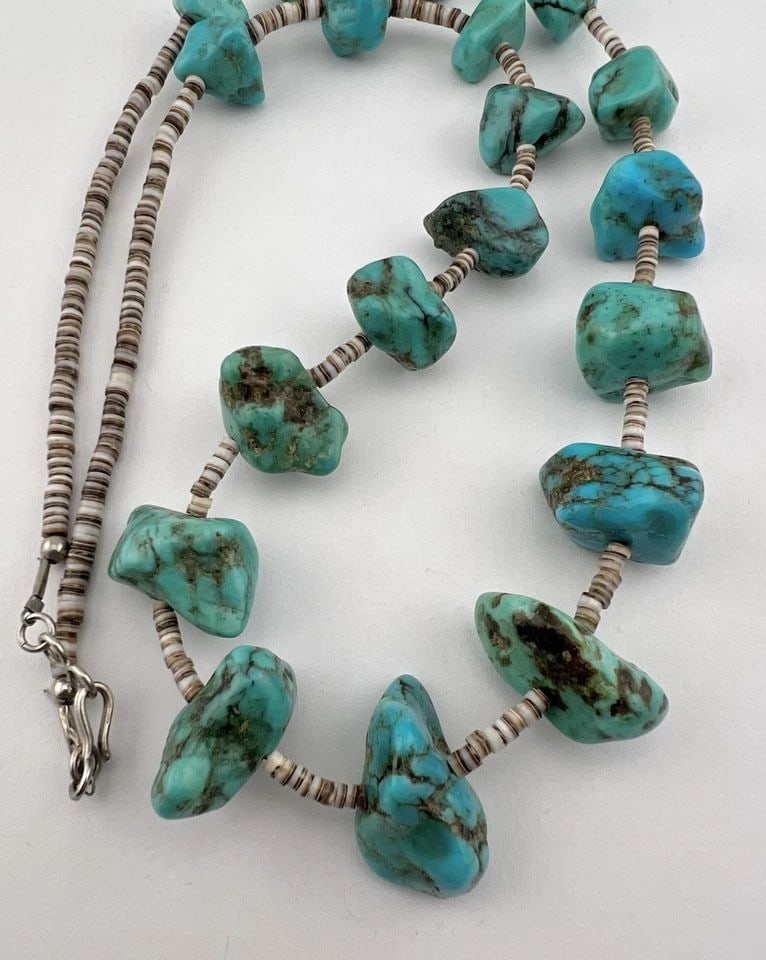 SANTO DOMINGO KEWA SLEEPING BEAUTY TURQUOISE & OLIVE SHELL HEISHI NECKLACE 28": SANTO DOMINGO KEWA SLEEPING BEAUTY TURQUOISE & OLIVE SEHLL HEISHI NECKLACE 28" Vtg Santo Domingo Kewa Sleeping Beauty Turquoise & Olive Sehll Heishi Necklace 28" The Stones are From 17mm to 26mm Wide 