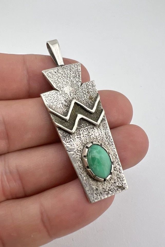 VINTAGE JACK BLY KEWA SANTO DOMINGO TURQUOISE TUFA CAST STERLING SILVER PENDANT: VINTAGE JACK BLY KEWA SANTO DOMINGO TURQUOISE TUFA CAST STERLING SILVER PENDANT Vintage Jack Bly Kewa Santo Domingo Turquoise Tufa Cast Sterling Silver Pendant Size: 2 3/8" Tall With Bail & 7/8" Wide 