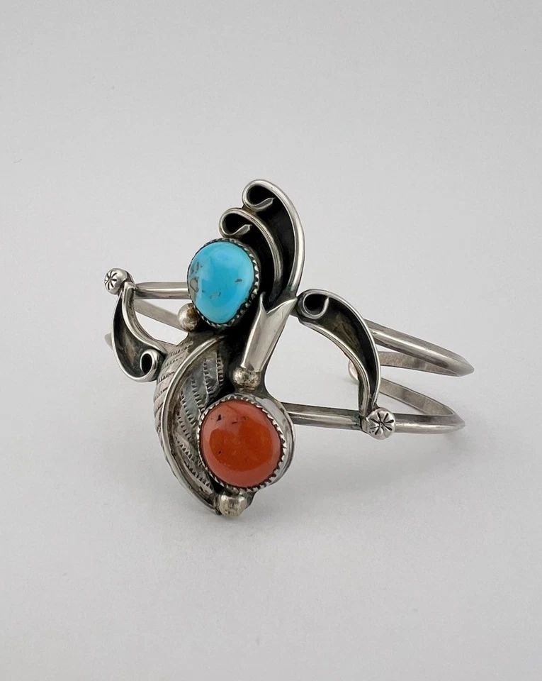 VINTAGE NAVAJO STERLING SILVER TURQUOISE & CORAL STAMPED BLOSSOM CUFF BRACELET: Vintage Navajo Sterling Silver Turquoise & Coral Stamped Blossom Cuff Bracelet Cuff is Around 4 3/4" tip to Tip and has a 1 3/8" Wide Adjustable Gap Cuff Is Just Under 1 3/4" Wide In the Center Weight