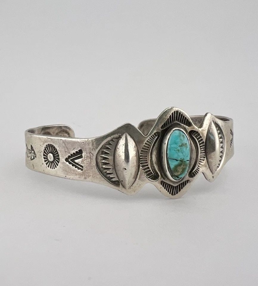 OLD FRED HARVEY NAVAJO COIN SILVER CERRILLOS TURQUOISE STAMPED CUFF BRACELET: OLD FRED HARVEY NAVAJO COIN SILVER CERRILLOS TURQUOISE STAMPED CUFF BRACELET Old Fred Harvey Navajo Coin Silver Cerrillos Turquoise Stamped Cuff Bracelet Cuff is 5 1/2" tip to Tip and has an 7/8" Wide
