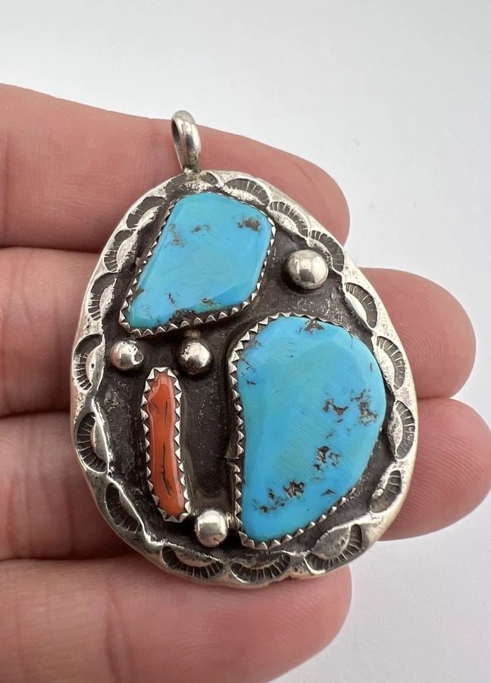 VTG ZUNI STERLING SILVER KINGMAN TURQUOISE & CORAL STAMPED TEARDROP PENDANT 2": VTG ZUNI STERLING SILVER KINGMAN TURQUOISE & CORAL STAMPED TEARDROP PENDANT 2" Vtg Zuni Sterling Silver Kingman Turquoise & Coral Stamped Teardrop Pendant 2" Size: 2" Tall With bail by Almost 1 1/2" W