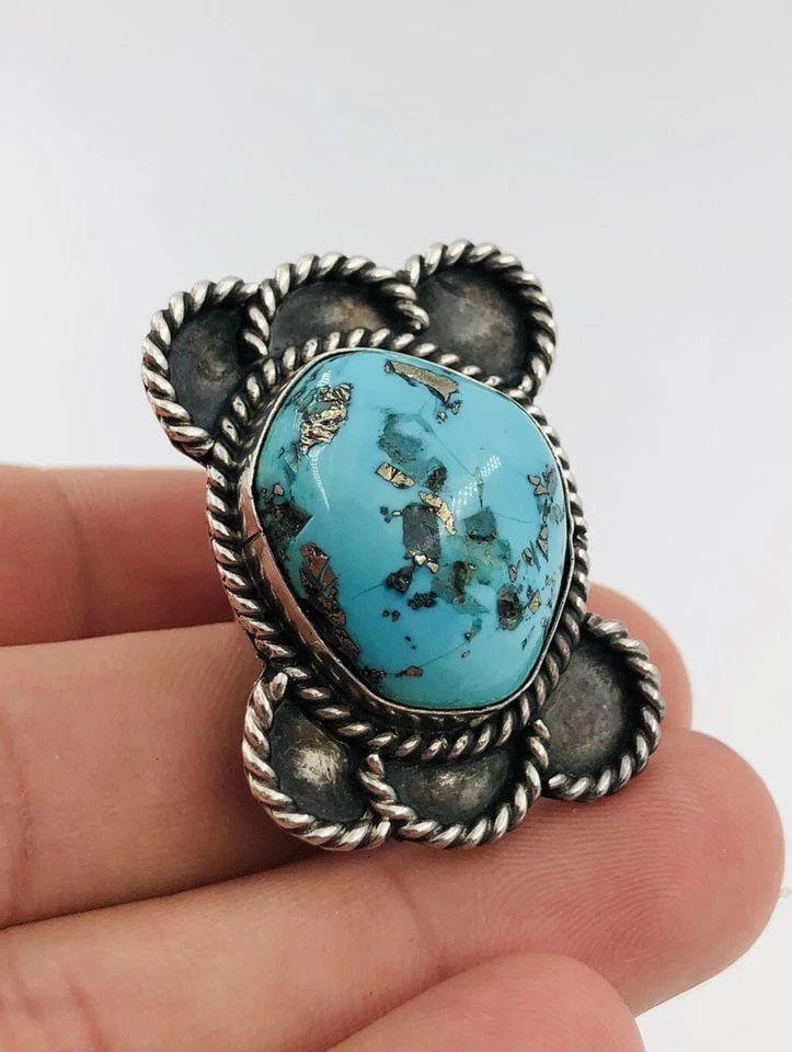 HUGE VTG NAVAJO STERLING SILVER NATURAL NEVADA TURQUOISE SLAB RING 16.5G: HUGE VTG NAVAJO STERLING SILVER NATURAL NEVADA TURQUOISE SLAB RING 16.5G HUGE Vtg Navajo Sterling Silver Natural Nevada Turquoise Slab Ring 16.5g Size: 5.75 Weight is 16.5 Grams on my scale Metal: Ste