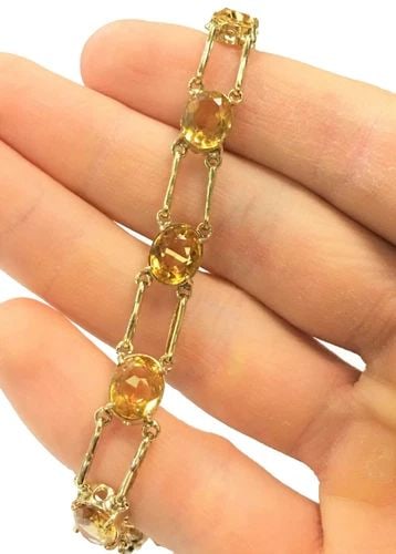 TWO TONE STERLING SILVER 7" BRACELET 16.4 GRAMS: TWO TONE STERLING SILVER 7" BRACELET 16.4 GRAMS This two-tone sterling silver 7" bracelet weighs 16.4 grams and features a classic chain style. Made from high-quality 925 sterling silver, this