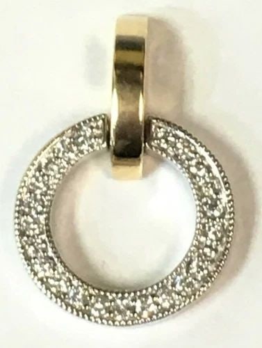 STERLING SILVER ROUND MOTHER OF PEARL PENDANT: STERLING SILVER ROUND MOTHER OF PEARL PENDANT This Sterling Silver Round Mother of Pearl Pendant features a classic and elegant design, perfect for everyday wear. The white mother of pearl main stone 