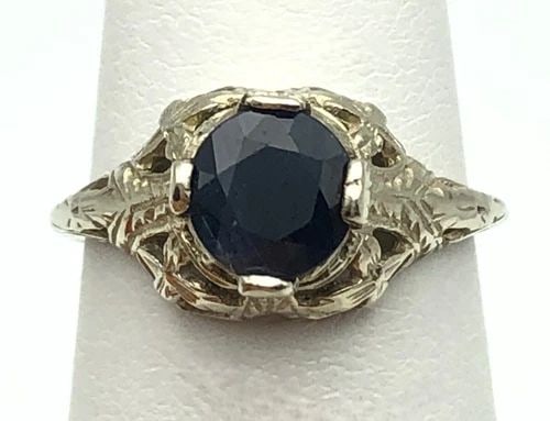 STERLING SILVER AND COLORLESS STONE ETERNITY BAND SIZE 7 (1 of 2)